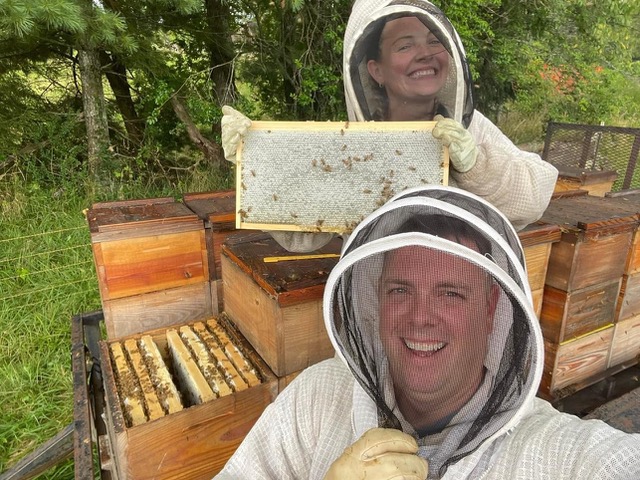 Beekeeper Ashby Millr and his wife Cori.