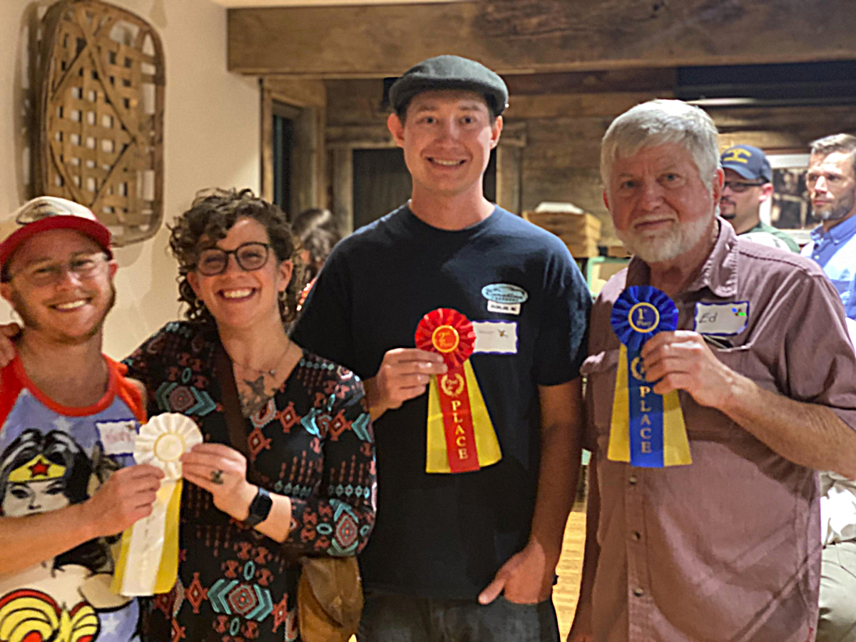 Photo from left to right: Knox Petrucci and Aly Wisely with Heart’s Relief Apiary, Yancey Jones with Hawk Branch Honey, and Ed Geouge with Blue Rock Apiary