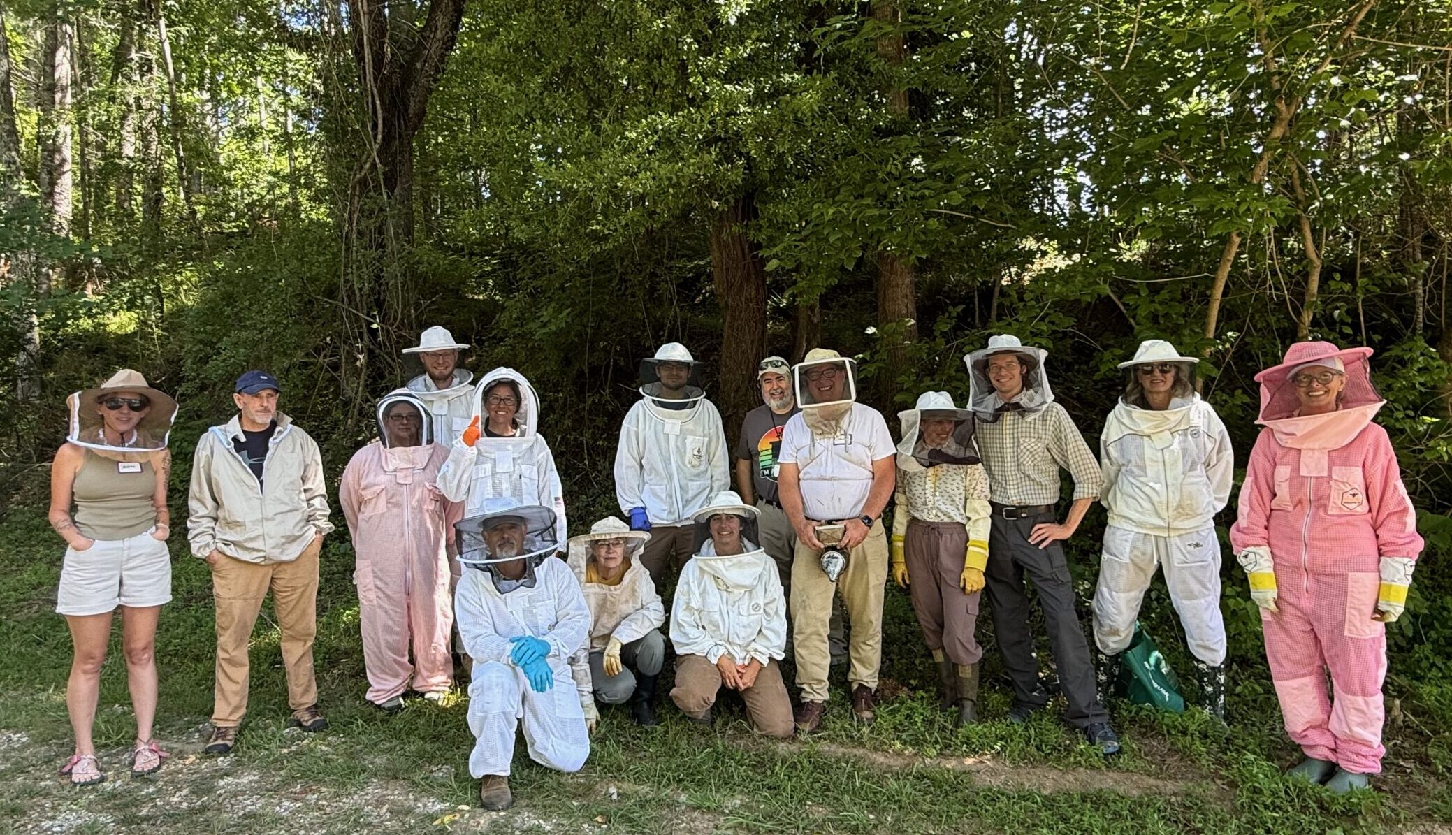 Members attending and educational event at the apiary with NC State
Apiarist Lewis Cauble.